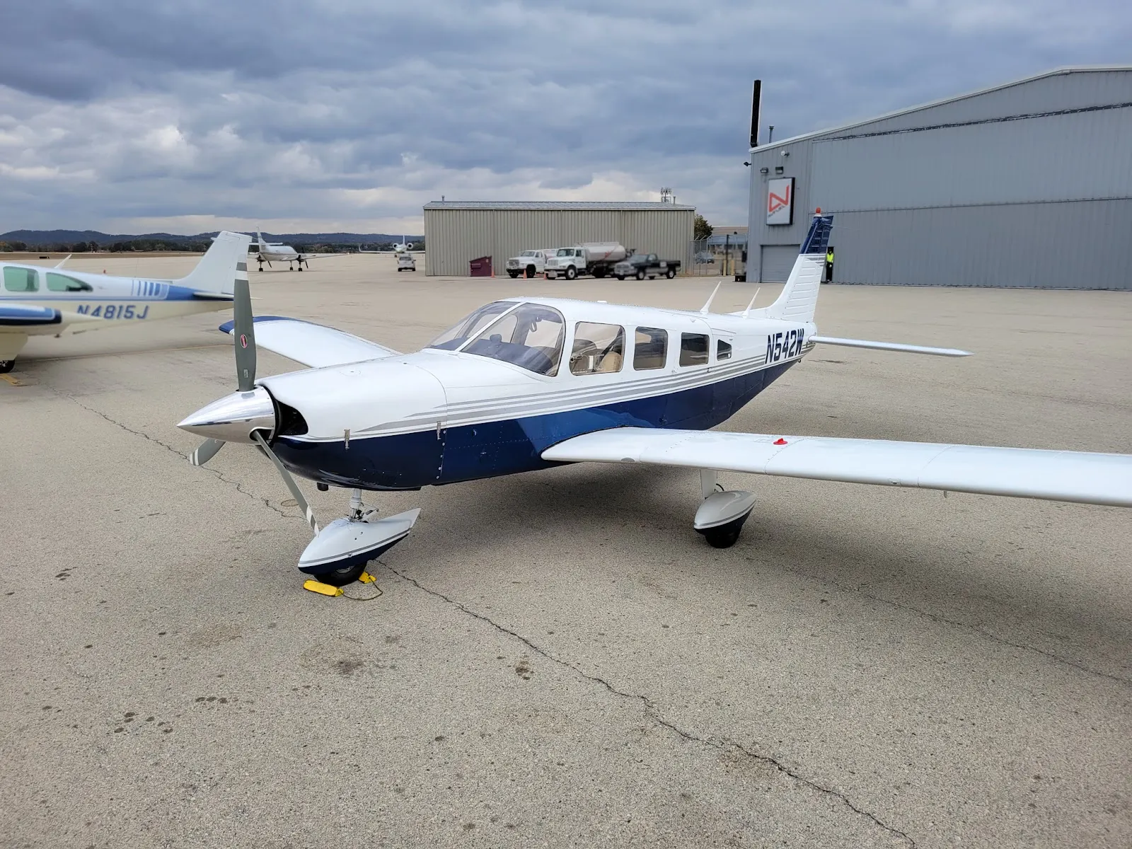 N542W on the ramp beside other aircraft