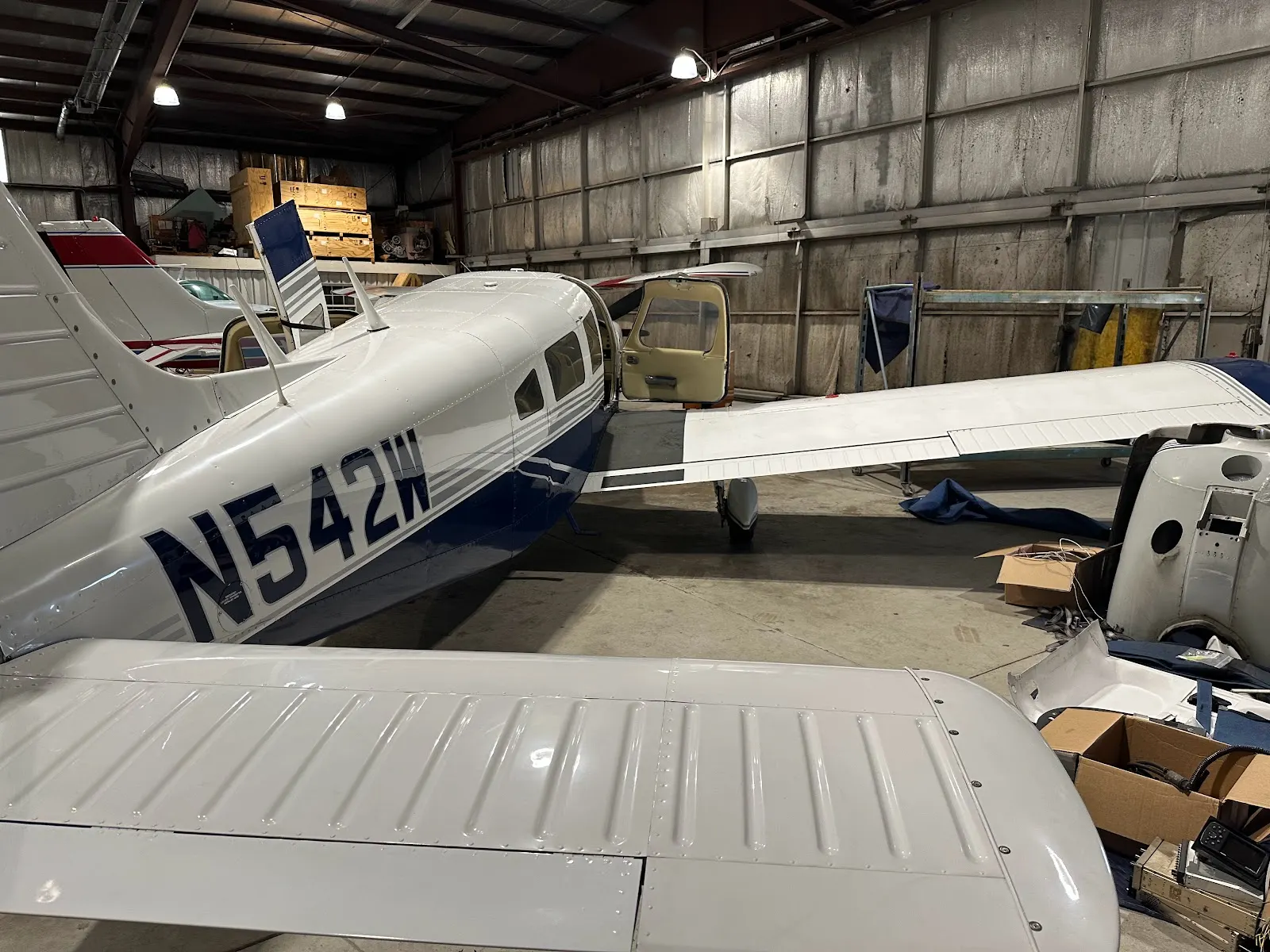 N542W in the hangar with the wing in the foreground
