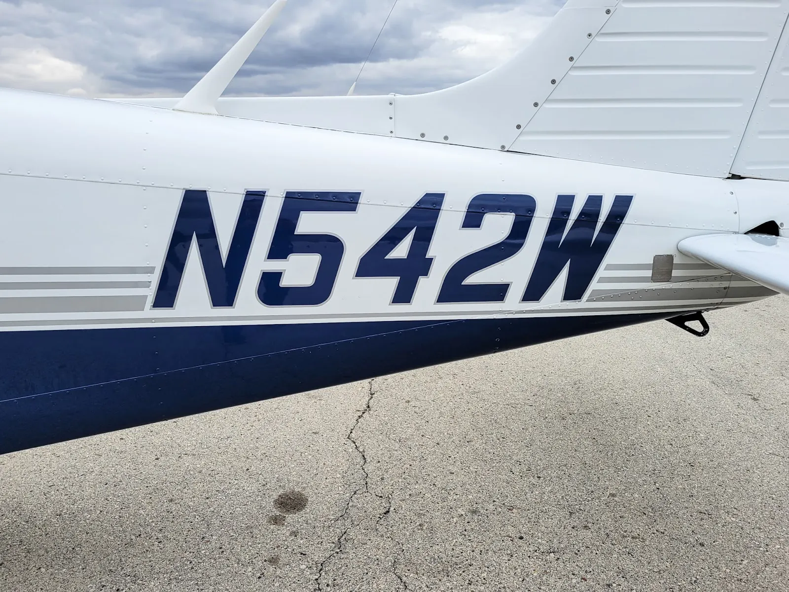 N542W registration on the navy and white fuselage